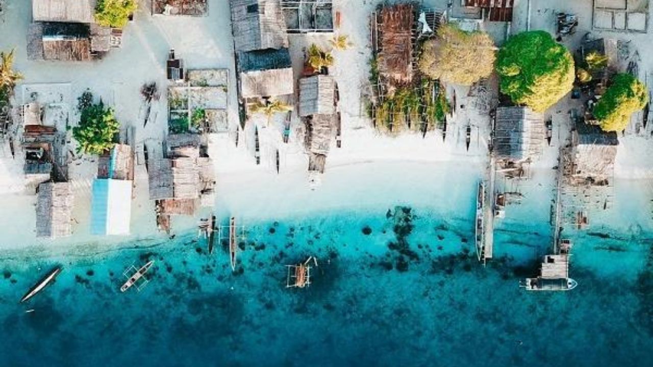 Pesona Pulau Kofiau: Keindahan Terumbu Karang dan Pasir Putih yang Memukau