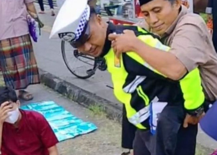 Aksi Heroik Bripka Agung Tuai Pujian, Gendong Pria Paruh Baya untuk Sholat Idul Fitri 1444H 